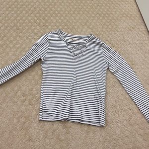 full sleeve night out top. black and white stripes. cross neck